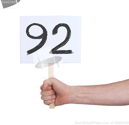 Image of Sign with a number, 92