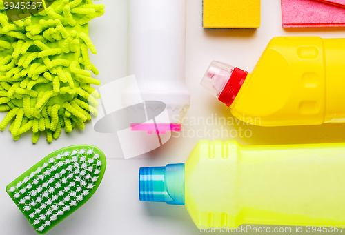 Image of House cleaning products on white table