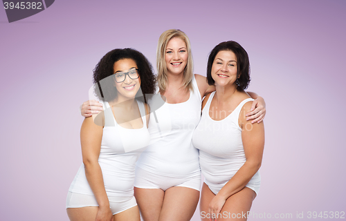 Image of group of happy plus size women in white underwear