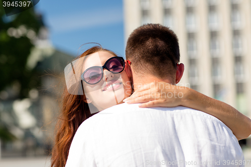 Image of smiling couple in city