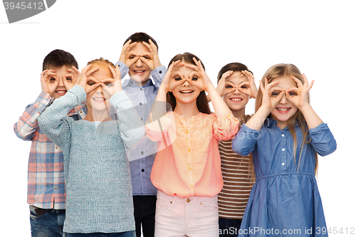 Image of happy children making faces and having fun