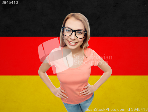 Image of happy young woman or teenage girl in eyeglasses