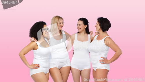 Image of group of happy different women in white underwear