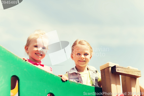 Image of happy little girls on children playground
