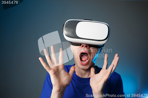 Image of Man using VR glasses