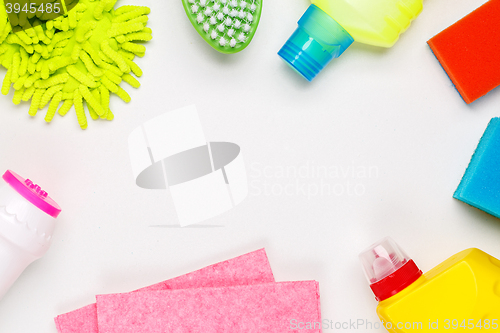 Image of House cleaning products on white table