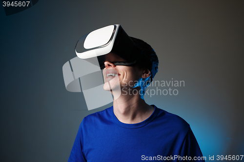 Image of Man using VR glasses