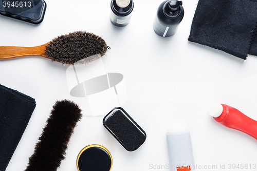 Image of Cleaning boots concept on white background