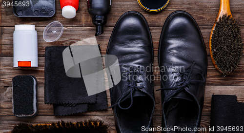 Image of Shoe wax, brush and boot