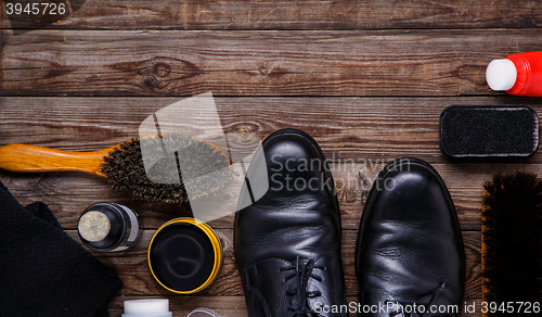 Image of Shoe wax, brush and boot