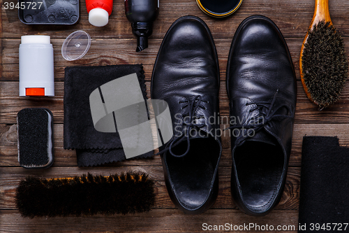 Image of Shoe wax, brush and boot