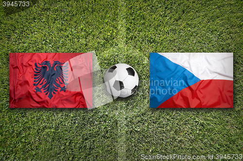 Image of Albania vs. Czech Republic flags on soccer field