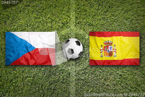 Image of Czech Republic vs. Spain flags on soccer field