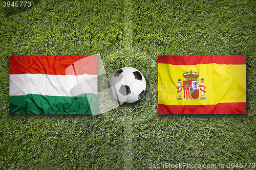 Image of Hungary vs. Spain flags on soccer field