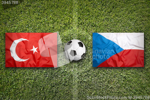 Image of Turkey vs. Czech Republic flags on soccer field