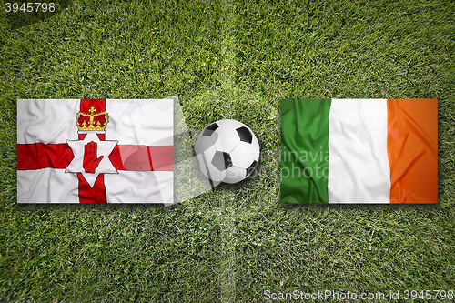 Image of Northern Ireland vs. Ireland flags on soccer field