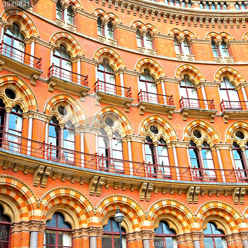 Image of old architecture in london england windows and brick exterior   