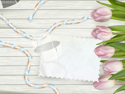 Image of Bouquet of tulips on rustic wooden board. EPS 10