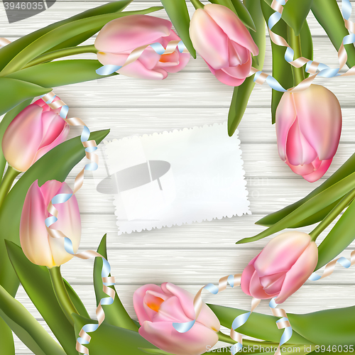 Image of Bouquet of tulips on rustic wooden board. EPS 10