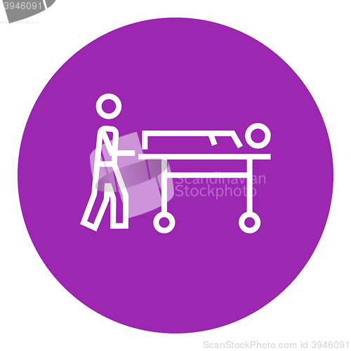 Image of Man pushing stretchers line icon.