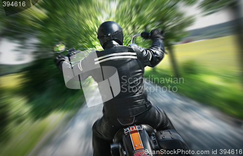 Image of Lone motorbike rider