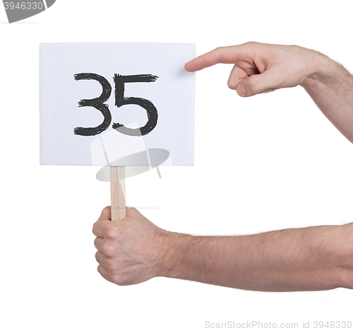 Image of Sign with a number, 35