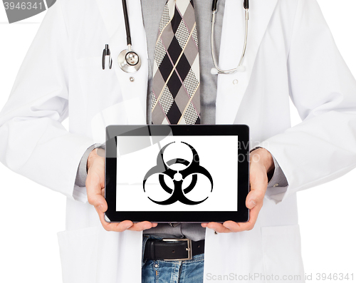 Image of Doctor holding tablet - Warning! Biohazard!