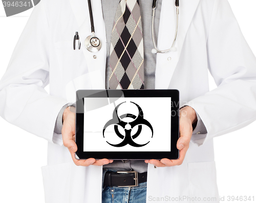 Image of Doctor holding tablet - Warning! Biohazard!