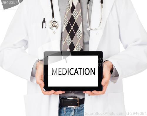 Image of Doctor holding tablet - Medication