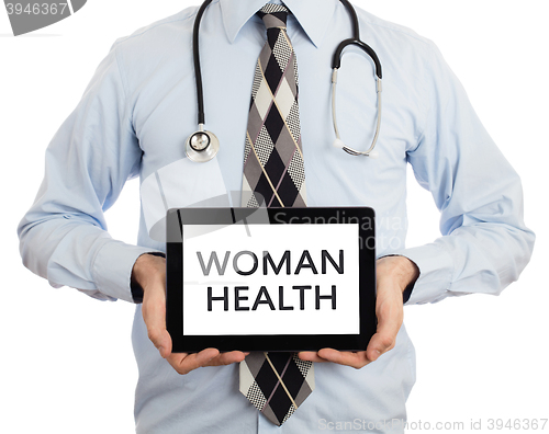 Image of Doctor holding tablet - Woman health