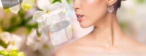 Image of close up of beautiful woman face with earring