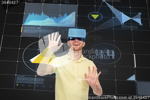 Image of happy man in virtual reality headset or 3d glasses