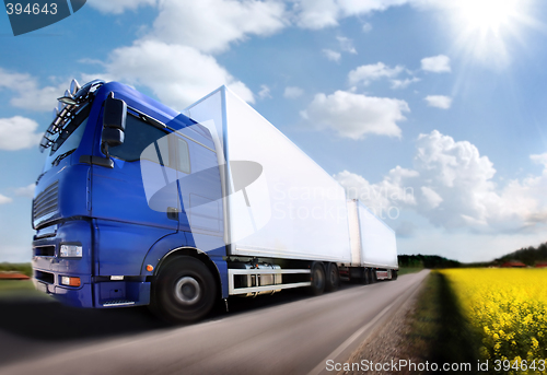 Image of truck driving on country-road/motion