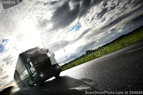 Image of truck driving on country-road/motion