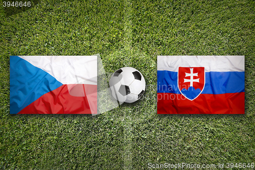 Image of Czech Republic vs. Slovakia flags on soccer field