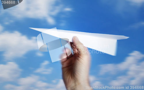 Image of throwing a paper plane.. , motion blur