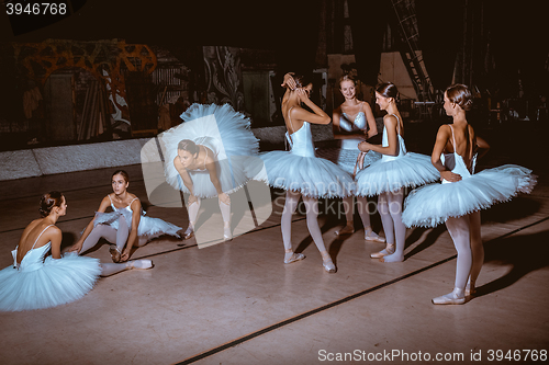 Image of The seven ballerinas behind the scenes of theater