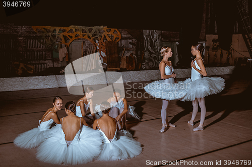 Image of The seven ballerinas behind the scenes of theater