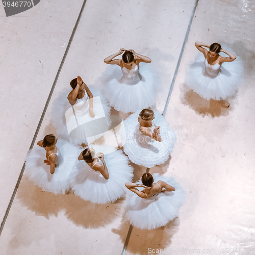 Image of The seven ballerinas on floor