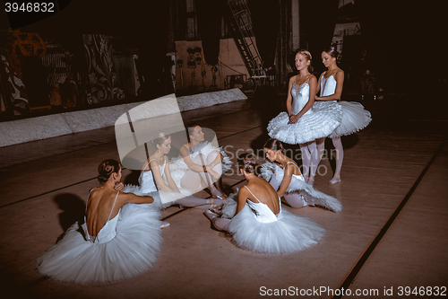 Image of The seven ballerinas behind the scenes of theater