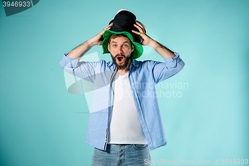 Image of The football fan over blue