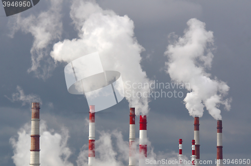 Image of Smoking chimneys against the sky