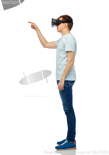 Image of happy man in virtual reality headset or 3d glasses