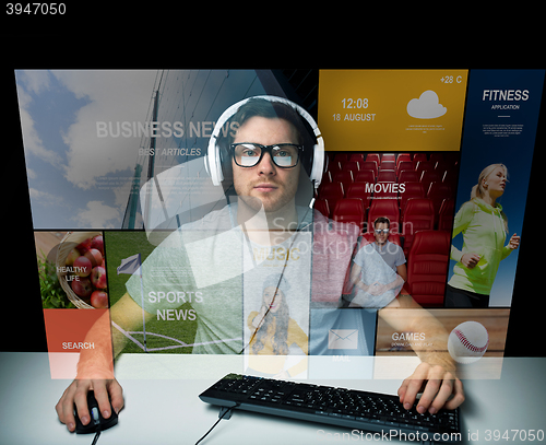 Image of man in headset computer over virtual media screen