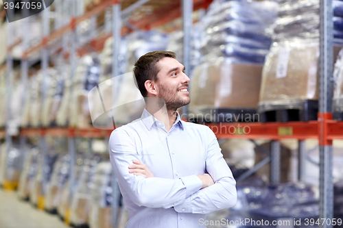 Image of happy man at warehouse