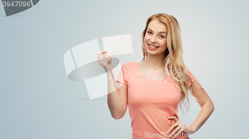 Image of happy woman or teen girl with blank white paper