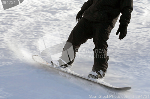 Image of man snowboarding