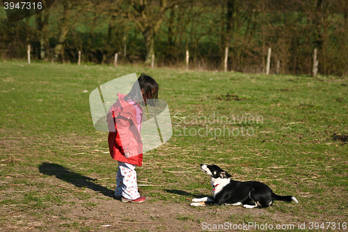 Image of Child and dog