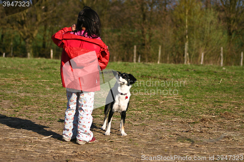 Image of Child and dog