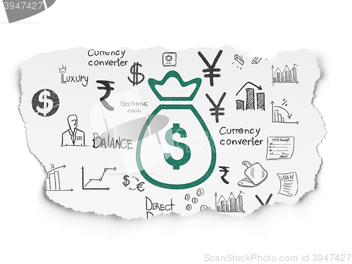 Image of Banking concept: Money Bag on Torn Paper background